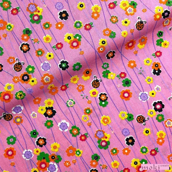 Baumwollstoff in rosa bedruckt mit bunten Blümchen 100% Baumwolle (0,5m) SWAFING